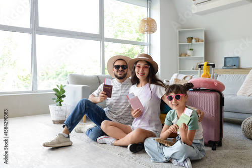 Family of tourists with pas...