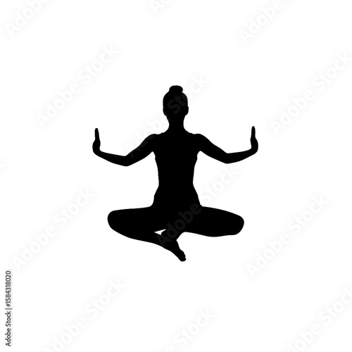 Woman meditating in lotus position with arms extended in calm state  