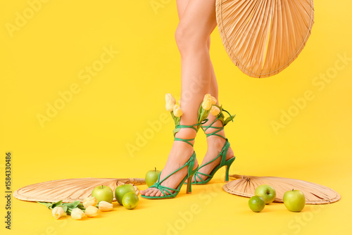 Female legs in green high h...