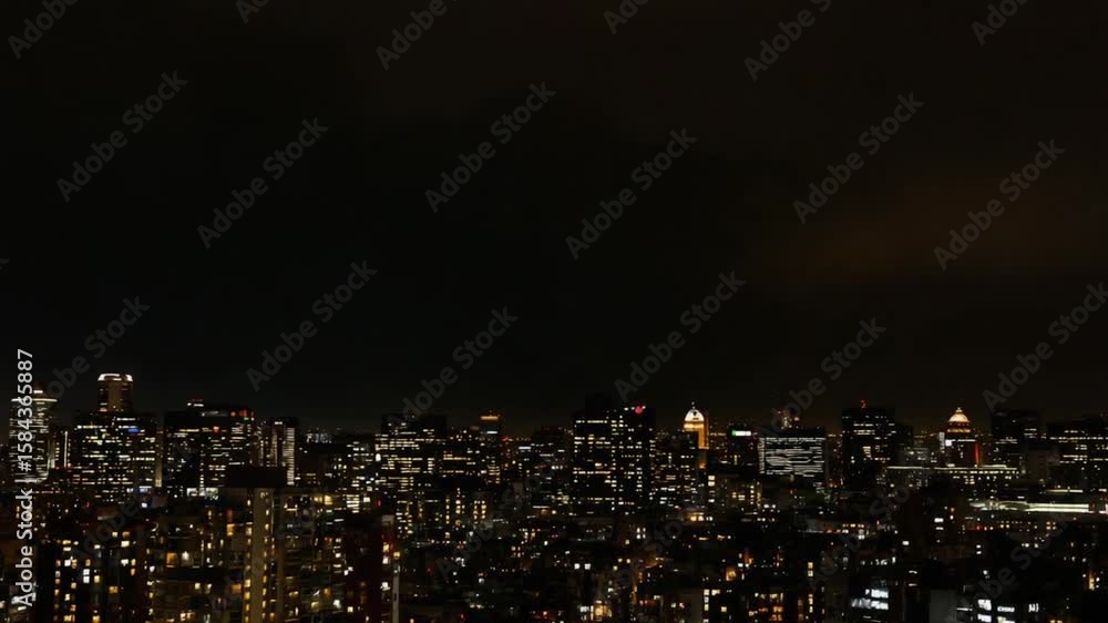 Vibrant Metropolitan Skyline at Night with Dazzling Building Lights Against a Dark Sky, Capturing the Essence of Urban Energy and Nightlife Vibrant Metropolitan Skyline at Night with Dazzling Building Lights Against a Dark Sky, Capturing the Essence of Urban Energy and Nightlife