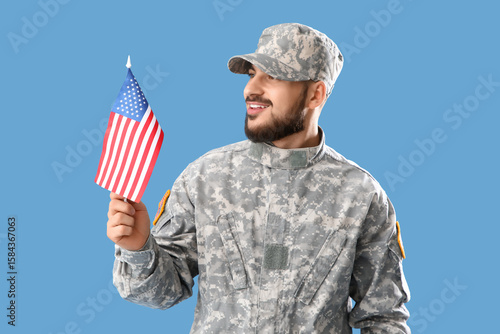 Soldier with USA flag on bl...