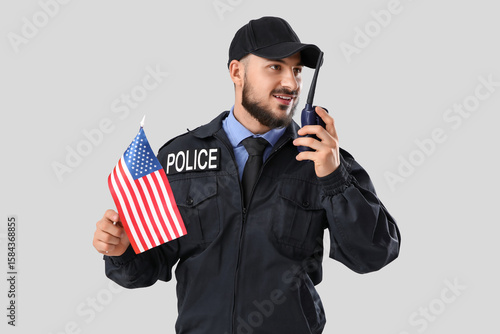 Police officer with radio t...
