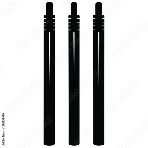 Three black cricket stumps with bails on a white isolated background