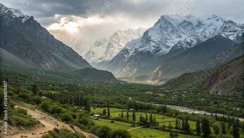 Sunlit Valley Majestic Moun...