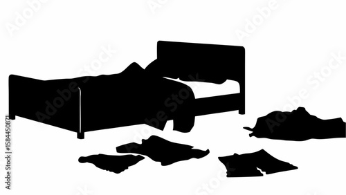 Silhouette of a bed with blankets and pillows and scattered clothes on the floor in a bedroom scene