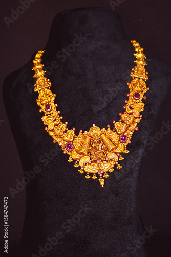Traditional Pure Gold ornaments with marvelous stones and intricate designs. Temple Gold Jewellery.  Gold Haram necklaces for special occasions. Gold Harams or haarams.