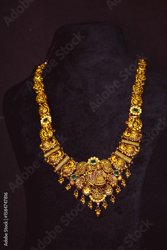 Traditional Pure Gold ornaments with marvelous stones and intricate designs. Temple Gold Jewellery.  Gold Haram necklaces for special occasions. Gold Harams or haarams.