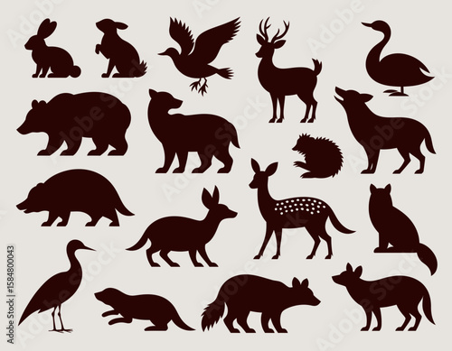 A collection of silhouette illustrations featuring various animals, including a rabbit, bear, deer, swan, and other wildlife species.