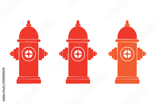 Three fire hydrants in varying shades of red stand ready for emergencies