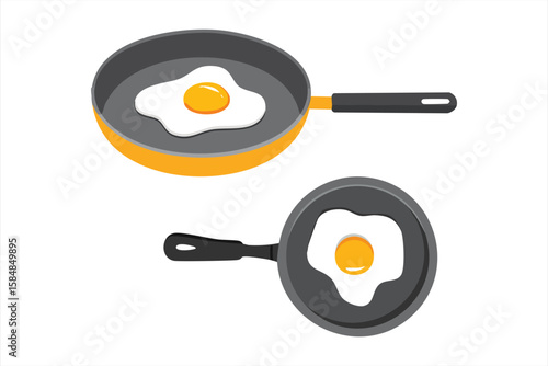 Two frying pans with fried eggs isolated on white background