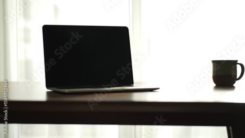 Wallpaper Mural cup of coffee and laptop on the table Torontodigital.ca