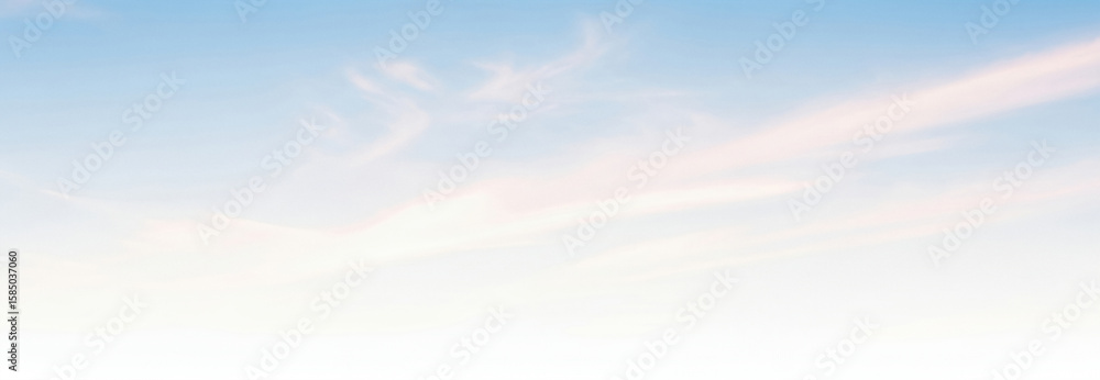 Obraz premium Light blue sky filled with soft white clouds and a subtle white gradient near the horizon, providing a gentle and clean visual perfect for banners or peaceful backgrounds.