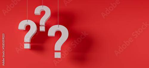 Fototapeta Naklejka Na Ścianę i Meble -  Three hanging white question marks in front of a red wall with copy space -  3D illustration