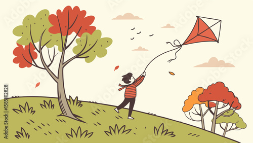 A person flying a kite on a grassy hill with autumn trees in the background.