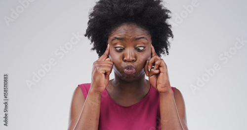 Photos Cross eyes, silly and black woman in studio with funny face for emoji, comedy and humor