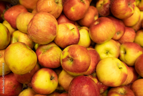 Background of fresh yellow-red apple fruits.