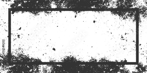 Distressed rectangular frame with scattered dark particles on white background abstract black