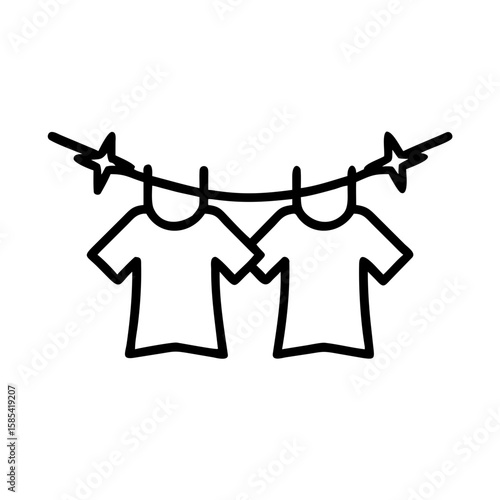 Clothes hanging on a line with clothespins in minimalist style  