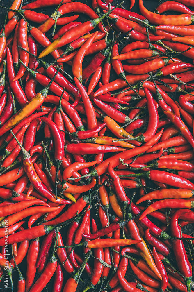 Fototapeta premium Tabasco chillies on an old metal tray background