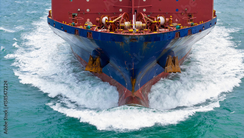 Nose Cargo container Ship, cargo vessel ship carrying container and running for import export concept technology freight shipping sea freight by Express Ship. front view