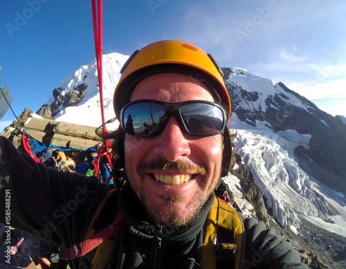 A dynamic selfie of a rock climber surrounded by glaciers, showcasing icy terrain, snow-covered peaks, and essential climbing equipment in an epic alpine setting.