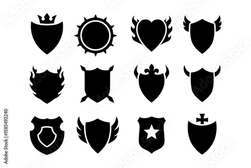 Silhouette shield icons collection with wings, stars, and crowns