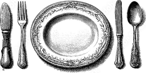 Vintage engraved cutlery and plate set for restaurant design