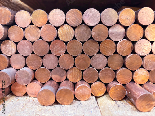 New Copper rods in a wooden packing case waste from a factory to be recycled