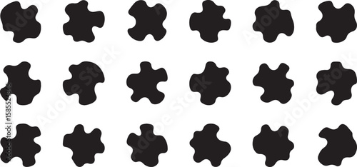 Collection of irregular black organic shapes scattered on a white background