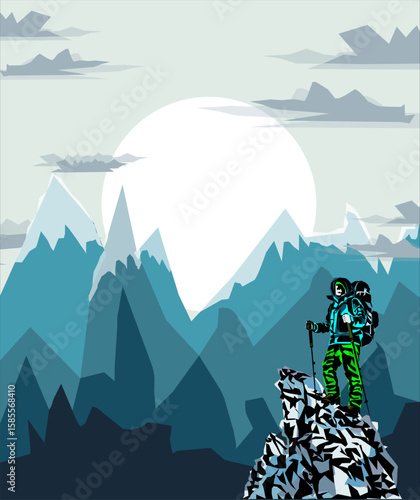 Man on the top of the mountain looks at the beautiful landscape of the mountains.