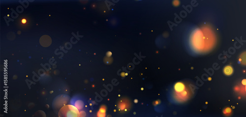 Colorful bokeh lights on dark blue background - gold circles blur softly with sparkles. Festive abstract scene in warm atmosphere for celebration designs, holiday cards or dreamy wallpapers.