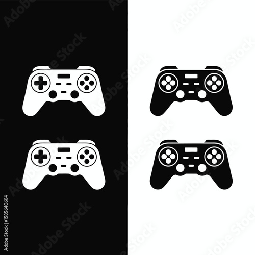 Four video game controllers displayed in a contrasting black and white pattern