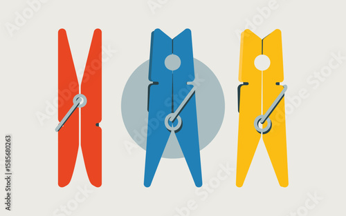 Three colorful clothes pins arranged in a row on a light background