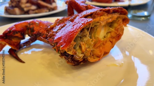 large cooked crab cut in half on a plate