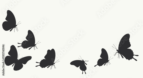 Graceful flight: Silhouette of butterflies against a minimalist background, serene art