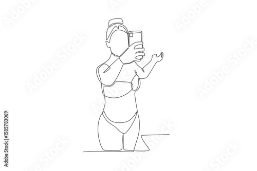 Bikini-clad woman makes a blog while traveling
