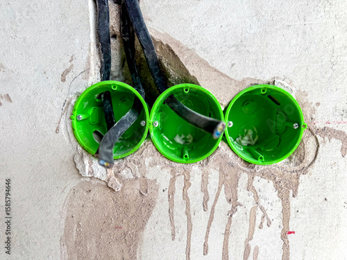 Overhead electrical cables in tubing during wiring phase. Industrial, renovation, or smart home installation visuals. Construction, repairs and electrical systems