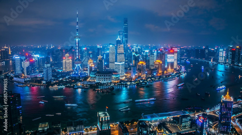 Wallpaper Mural Dramatic Hong Kong skyline at night featuring illuminated skyscrapers reflected in harbor waters with vibrant neon lights and urban glow Torontodigital.ca