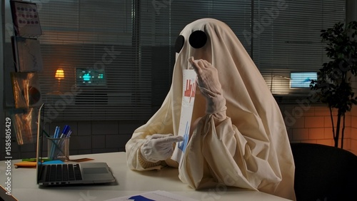 Obraz na plátně Ghostly Figure Presenting Charts in Office Setting