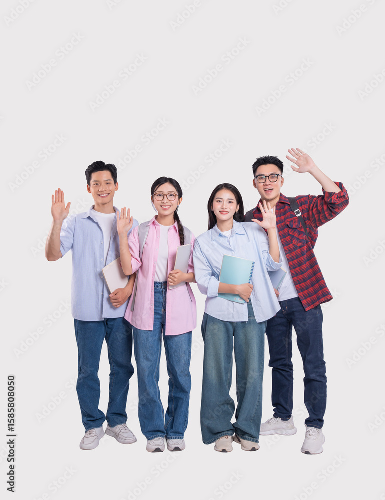 A group of smiling young adults presumably students waving against a neutral background in a studio A group of smiling young adults presumably students waving against a neutral background in a studio