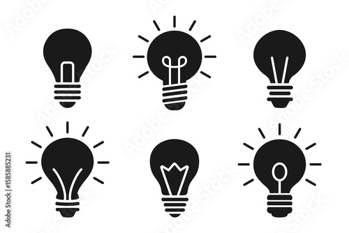 Light bulb icon collection. Set of flat lightbulb silhouettes with rays for idea, inspiration, and creativity concepts