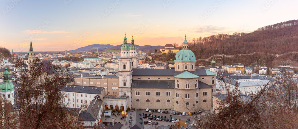 Fototapeta premium Aerial view of Salzburg Cathedral and historic old town at sunset in Salzburg, Austria
