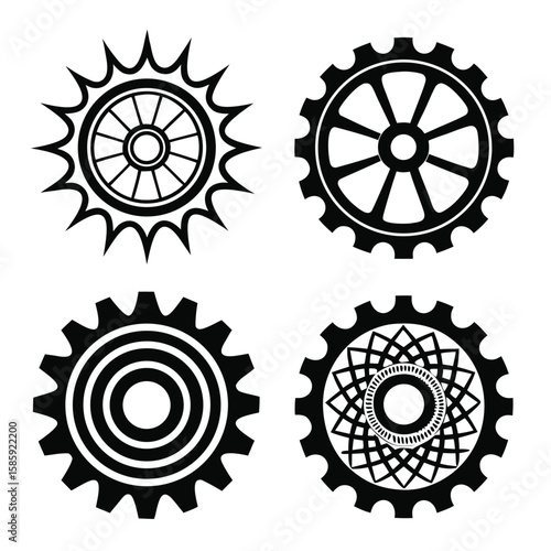 Four black gear symbols gears cogwheels