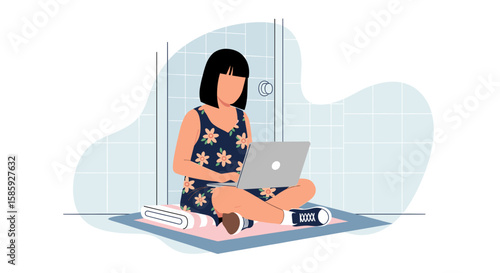 A young woman sits cross legged on a mat, using her laptop in a minimalist, modern bathroom setting, showcasing remote work or online studies.