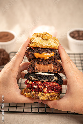 hands holding pilled cookies