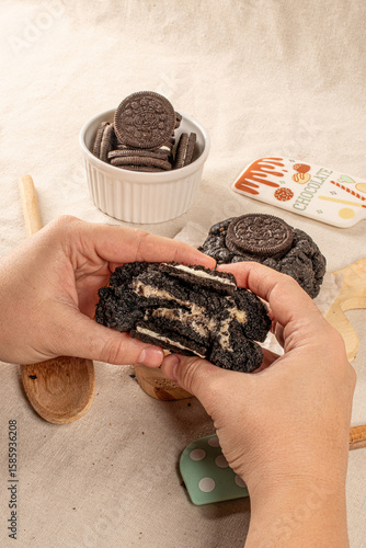 Hands Holding  dark chocolate cookie