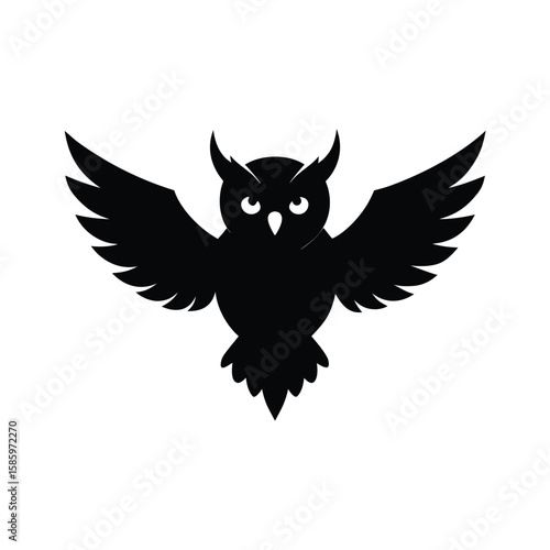Silhouette of owl in mid flight wings fully extended in graceful motion with white background