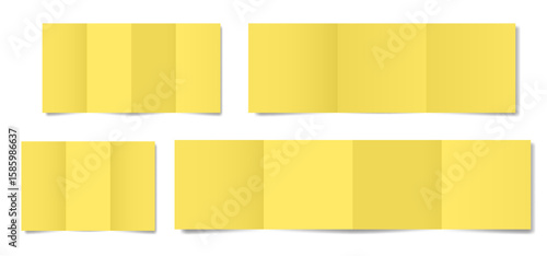 Set of yellow folded paper sheets. Double gate fold. Vertical pages. Blank booklet. Four panel accordion fold