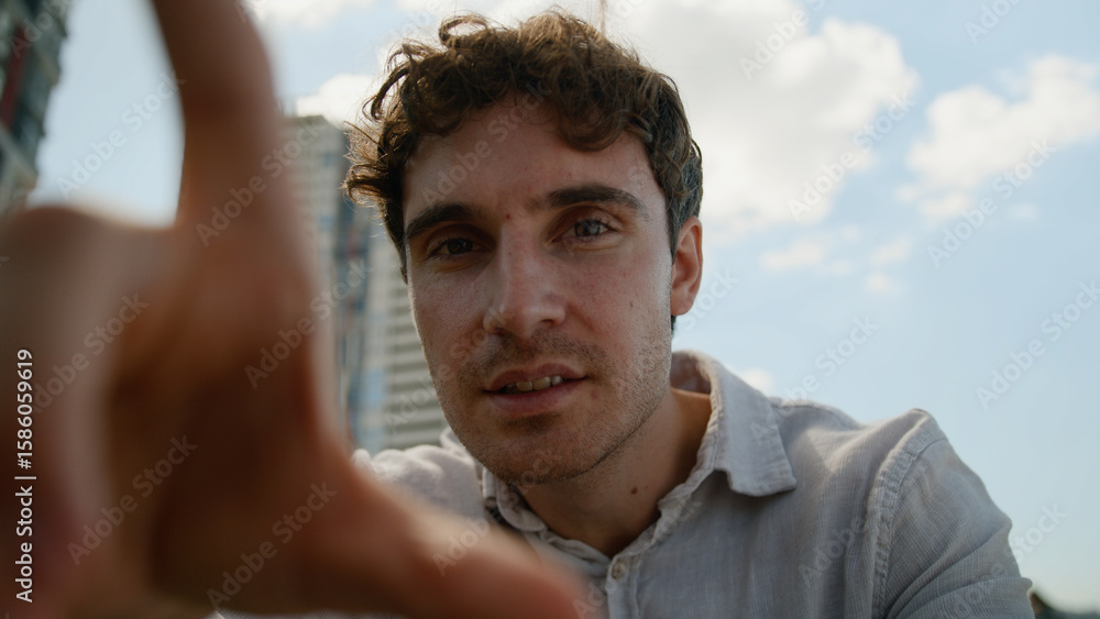 Obraz premium Point of view POV Caucasian man webcam male touchscreen guy zooming photo enlarge screen mobile phone addict scrolling smartphone cellphone business user fingers city outdoors display businessman zoom