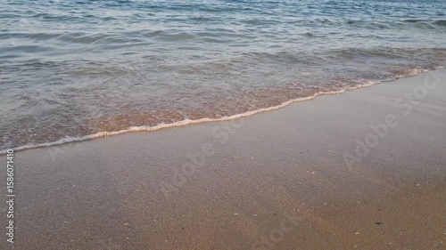 Wallpaper Mural Small waves at sunset on the sea. Torontodigital.ca